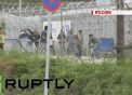 Haos la centru pentru refugiati din insula Lesbos. Motivul pentru care imigrantii au aruncat cu sticle si pietre in politisti - VIDEO