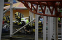 Momente dramatice intr-un parc de distractii. Un roller coaster a deraiat si a intrat intr-un carusel pentru copii - GALERIE FOTO
