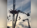 Zeci de persoane au ramas blocati pentru aproximativ 4 ore la o inaltime de 20 de metri. Salvatorii din Londra au avut nevoie de 3 ore ca sa coboare oamenii din caruselul defectat - VIDEO