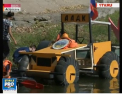 Show pe apa in Rusia. Pe un lac din orasul Astrahani au fost lansate zeci de corabii, confectionate din lucruri uzate: Localnicii au mesterit dragoni, tractoare si chiar motociclete - VIDEO