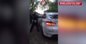 A urcat beat la volanul unui BMW X6, iar cand a fost oprit de politisti a blocat usile. Momentul in care un politist rus incearca sa sparga geamul masinii cu patul armei - VIDEO