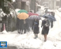 Surpriza pentru locuitorii din Tokyo. Pentru prima data in ultimii 54 de ani a nins in capitala Japoniei, in luna noiembrie - VIDEO