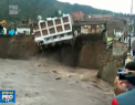 Imagini dramatice vin din Peru. Momentul in care un hotel cu trei etaje se prabuseste intr-un rau - VIDEO
