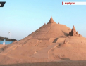 Si-a gasit loc in Cartea Recordurilor! Cum arata cel mai inalt castel din nisip construit pe o plaja din India - VIDEO