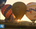 Calatorie de vis pentru un grup de britanici. 80 de baloane cu aer cald de diferite dimensiuni s-au ridicat de la sol, creand un adevarat spectacol pe cer - VIDEO