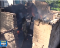 Separatistii din estul Ucrainei au atacat mai multe cartiere din orasul Avdeevka. Trei case au luat foc - VIDEO