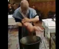Imagini controversate filmate la un botez in Romania: preotul se enerveaza si bruscheaza bebelusul - VIDEO