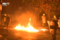 Violente la Atena. Zeci de tineri au aruncat cu sticle incendiare in fortele de ordine, care au folosit gaze lacrimogene in incercarea de a calma spiritele - VIDEO