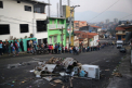 Gravida impuscata mortal de un soldat, in timp ce statea la coada sa cumpere mancare, in Venezuela - FOTO