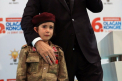 Imagini greu de privit. Promisiunea lui Erdogan pentru o fetita "soldat" - VIDEO