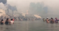 Imagini terifiante, din timpul incendiilor, ies la iveala in Grecia. Oamenii au fugit ingroziti din calea flacarilor in mare - VIDEO