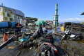 Clipe dramatice in Indonezia. De sub daramaturi se aud plansete si strigate de ajutor - GALERIE FOTO