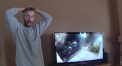 Reactia unui criminal filmat in timp ce urca in masina cadavrele familiei - VIDEO