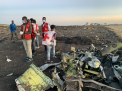 Crater urias format in locul in care s-a prabusit avionul Boeing in Etiopia. GALERIE FOTO