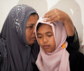 Un miracol dupa 10 ani. Un cuplu de indonezieni si-a regasit fiica pierduta in urma tsunami-ului din 2004