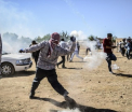 100.000 de kurzi din Siria au fugit in Turcia de frica jihadistilor. Turcii au inchis granitele si au folosit tunuri cu apa