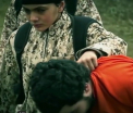 Statul Islamic a filmat o noua executie. Un baiat de 10 ani a impuscat in cap un spion israelian. VIDEO