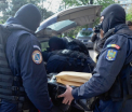 Perchezitii in Romania la contrabandistii de tigari aduse din Republica Moldova. 13 persoane, ridicate pentru audieri