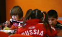 Vladimir Putin a promulgat legea ce interzice adoptiile copiilor rusi de catre americani