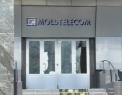 Descindere cu mascati la Moldtelecom. Ce au ridicat politistii din birourile institutiei