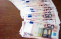 Politist din Calarasi, retinut in flagrant in timp ce primea bani de la o cersetoare! Vezi cat i-a cerut