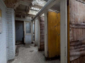 Impresionant! O toaleta publica, transformata intr-o casa de vis - FOTO