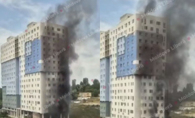 A luat foc un apartament, al unui bloc de locuit din capitală, aflat în construcții. Imagini cum iese fum negru din clădire - surprinse de martori - VIDEO
