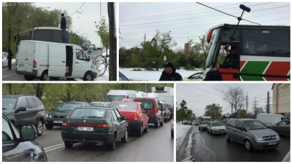 Un cablu s-a rupt si a cazut peste un autobuz pe strada Vadul lui Voda. Un sofer a incercat sa-l ajute: a urcat pe masina ca sa dea firul la o parte. In zona s-au format ambuteiaje - FOTO Un cablu s-a rupt si a cazut peste un autobuz pe strada Vadul lui Voda. Un sofer a incercat sa-l ajute: a urcat pe masina ca sa dea firul la o parte. In zona s-au format ambuteiaje - FOTO
