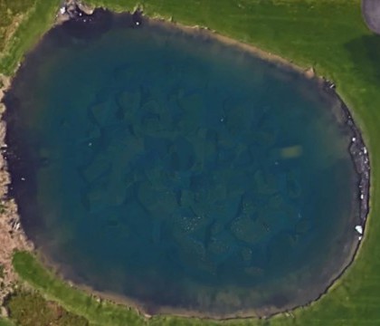 A observat o forma ciudata in lac si a alertat politia. Descoperirea pe care au facut-o era asteptata de mai bine de 10 ani A observat o forma ciudata in lac si a alertat politia. Descoperirea pe care au facut-o era asteptata de mai bine de 10 ani
