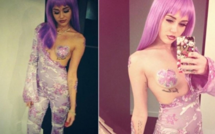 Miley Cyrus, pozata cu o sticla de alcool in mana, desi nu are varsta legala Miley Cyrus, pozata cu o sticla de alcool in mana, desi nu are varsta legala