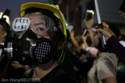  Ciocniri intre politisti si protestari dupa o manifestatie in sprijinul uigurilor din China