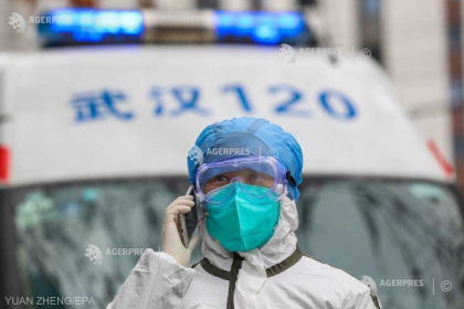 Coronavirus - Cadavrul unui barbat, lasat mai multe ore pe un trotuar din orasul Wuhan Coronavirus - Cadavrul unui barbat, lasat mai multe ore pe un trotuar din orasul Wuhan