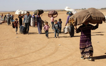 Coronavirusul ii sperie mai mult decat razboiul. Ce au facut mii de migranti sirieni de la granita cu Turcia