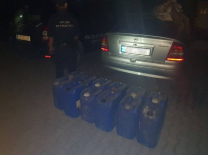 Un moldovean, prins cu 300 litri de alcool fara acte de provenienta. Buteliile au fost confiscate - FOTO