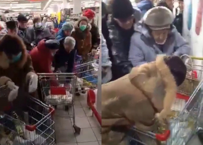 Lupta pentru zahar continua in Rusia. Momentul in care zeci de persoane dau buzna la un cos cu produse, dupa ce acesta este adus de un angajat al magazinului - VIDEO