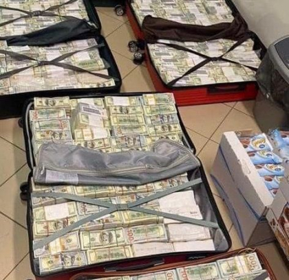 Sotia unui fost politician ucrainean - retinuta la vama din Ungaria, dupa ce a incercat sa treaca frontiera cu aproape 29 milioane de dolari si 1,3 milioane de euro ascunse in valize - FOTO