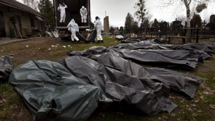 Un rus care a macelarit civilii din Bucha a fost identificat dupa mesajul pe care l-a vopsit pe peretele casei unui ucrainean - FOTO