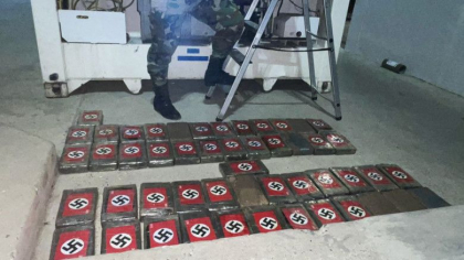 Captura uriasa de cocaina ambalata in pachete cu steagul nazist. Ce era inscriptionat in interior