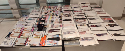 Pijamale si lenjerie intima mai mult decat pentru o vacanta. Un barbat de 51 de ani, prins la aeroport cu valiza plina - FOTO