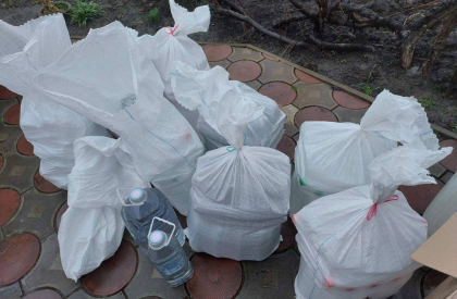 Perchezitii la Drochia: Femeie de 50 ani - cercetata pentru o afacere ilegala - FOTO