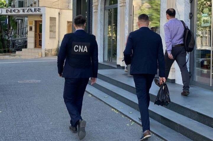 Percheziții în biroul unui angajat ANRE: Ar fi ajutat un agent economic să grăbească procesul de înregistrare a documentelor Percheziții în biroul unui angajat ANRE: Ar fi ajutat un agent economic să grăbească procesul de înregistrare a documentelor