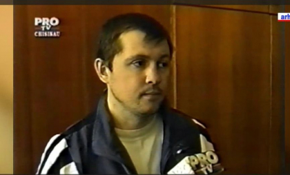 Interlopul Alexandr Sinegur - escortat la sediul PCCOCS. Acesta este acuzat de omor 