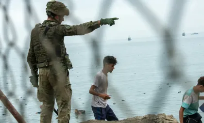 Migranți