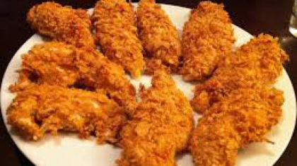 Un bucatar a facut publica reteta puiului crispy de la KFC - VIDEO
