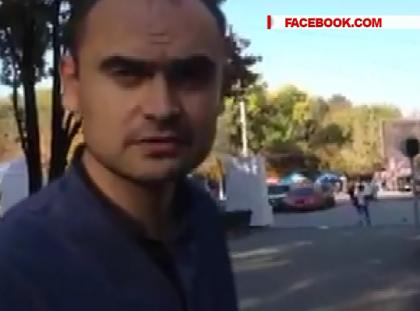 Activistul Andrei Donica, retinut pentru 72 de ore, dupa ce a varsat lapte peste ministrul Finantelor