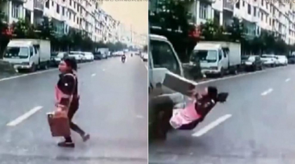 Imagini cutremuratoare. A fost la un pas sa fie calcata de o dubita, insa a scapat ca prin minune - VIDEO Imagini cutremuratoare. A fost la un pas sa fie calcata de o dubita, insa a scapat ca prin minune - VIDEO