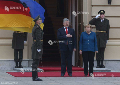 Prezidentiale in Ucraina: Angela Merkel il va primi pe Petro Porosenko inaintea celui de-al doilea tur de scrutin Prezidentiale in Ucraina: Angela Merkel il va primi pe Petro Porosenko inaintea celui de-al doilea tur de scrutin