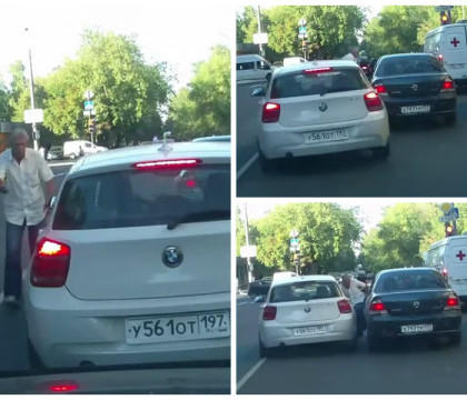 Incident socant surprins pe o strada din Rusia. Soferul unui BMW demareaza fara retinere peste un alt barbat cu care se certa Incident socant surprins pe o strada din Rusia. Soferul unui BMW demareaza fara retinere peste un alt barbat cu care se certa