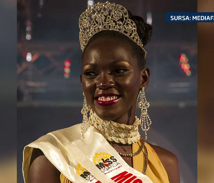 Miss Uganda, incoronata dupa ce a aratat ca stie sa mulga vacile si sa duca oile la pascut. Si tinuta de seara a ajutat-o Miss Uganda, incoronata dupa ce a aratat ca stie sa mulga vacile si sa duca oile la pascut. Si tinuta de seara a ajutat-o