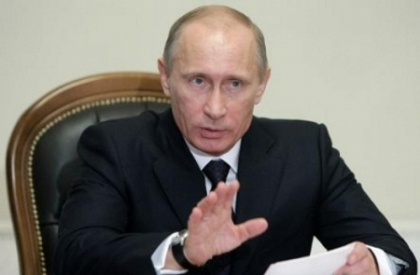 Putin promulga o lege care interzice fumatul in locuri publice Putin promulga o lege care interzice fumatul in locuri publice